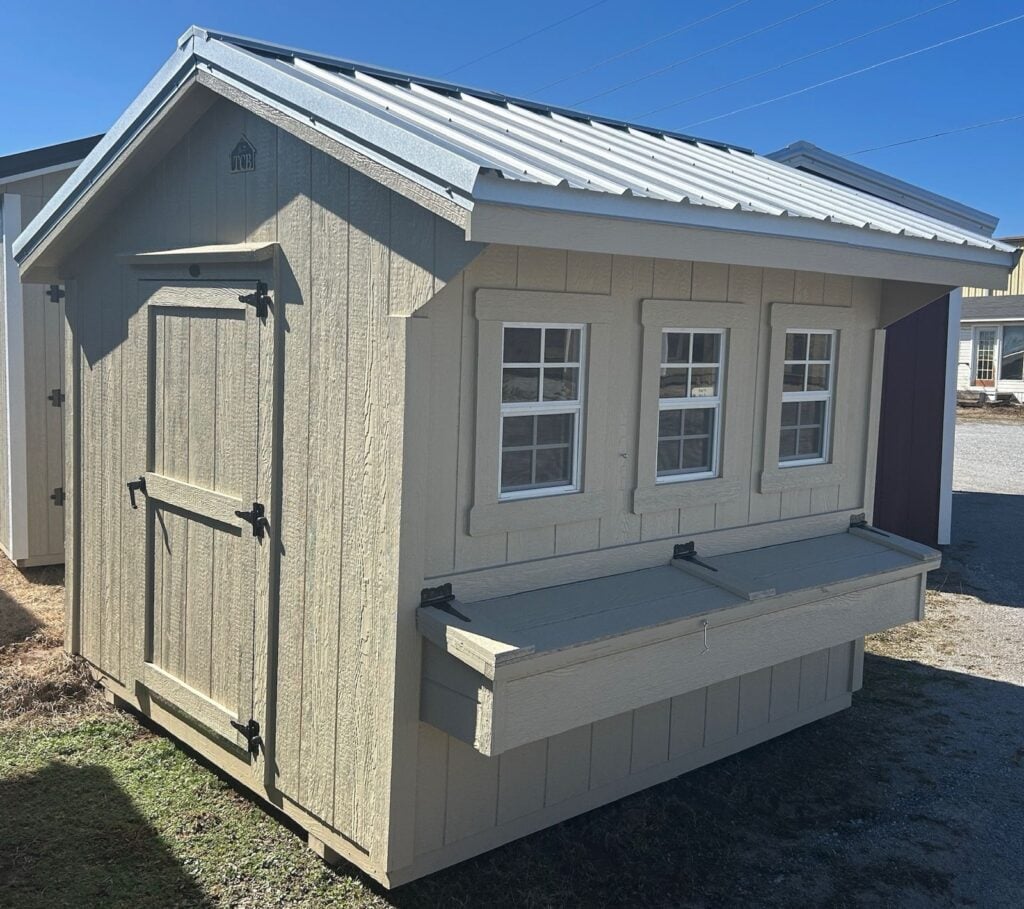 Chicken coop with nesting boxes and an exterior egg door